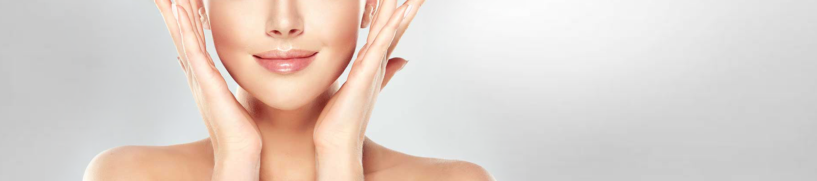 Gros plan éditorial d'un visage à la peau lisse et renouvelée en clinique O'Derma